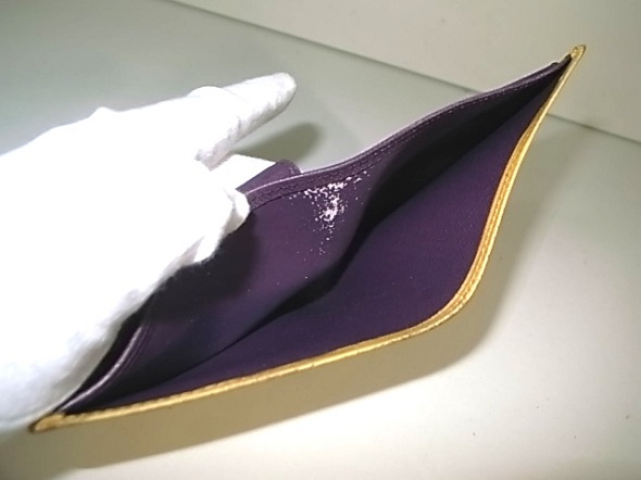 財布の紫の内張り剥離