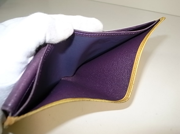 財布の紫の内張交換