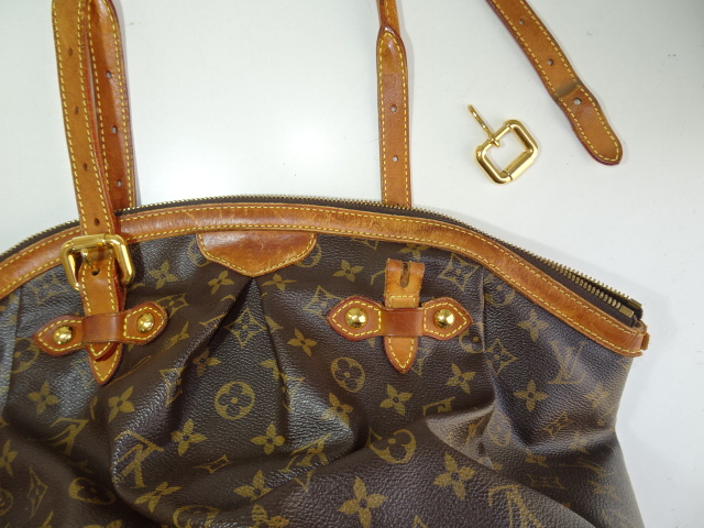 取っ手の根革が切れて金具も外れた